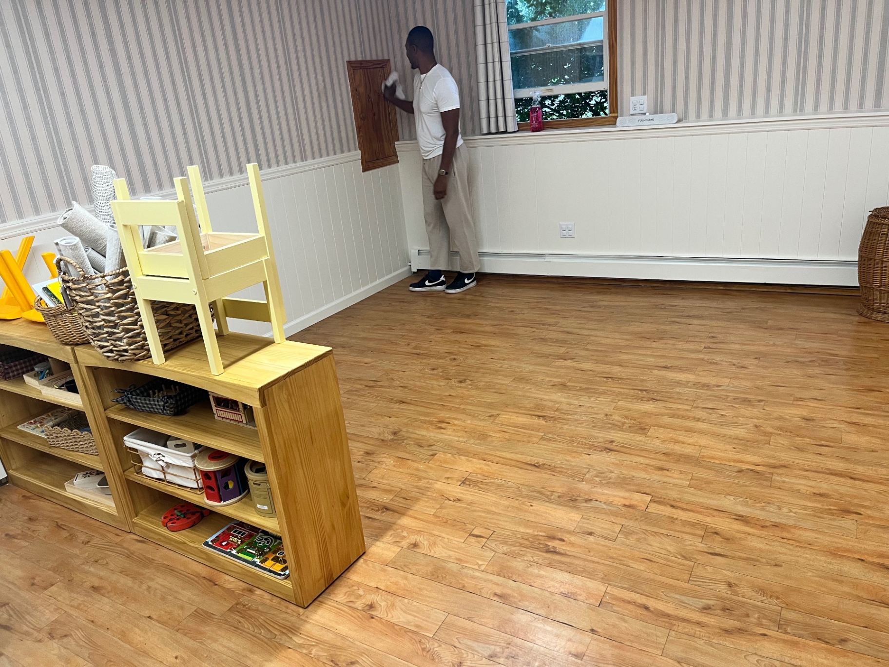 Daycare classroom being cleaned and reset by a Clean & Shine team member