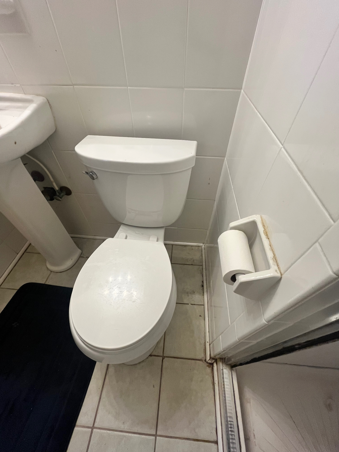 Bathroom & tile floor cleaning — before